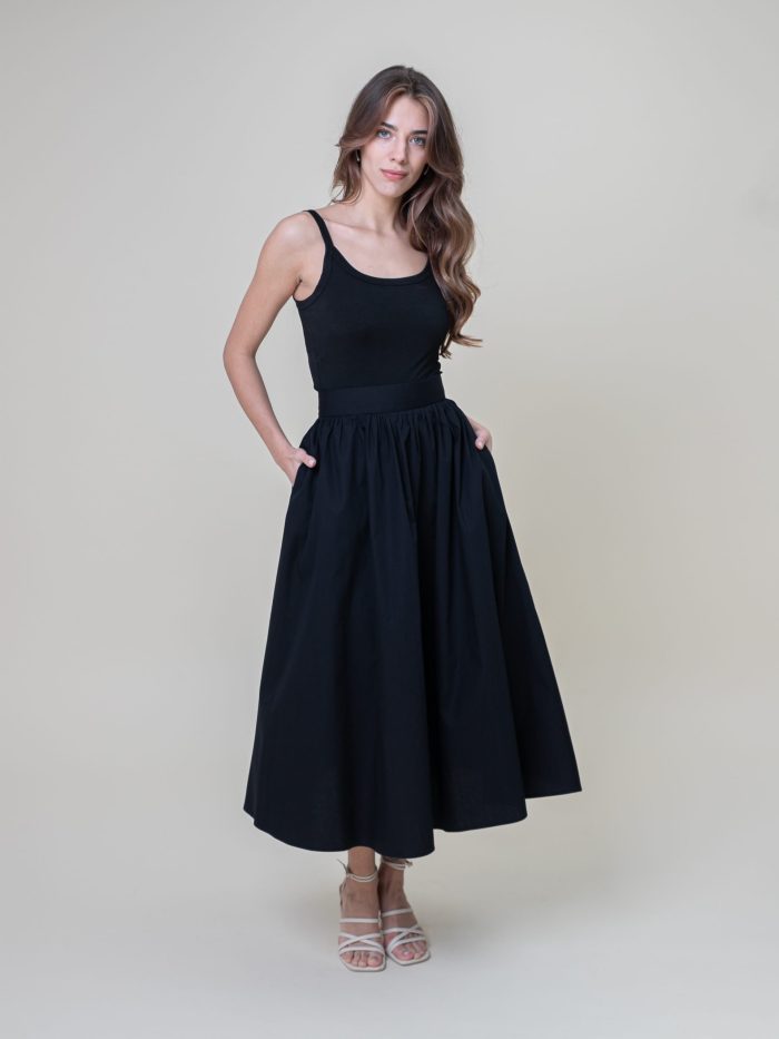 Cotton Poplin Midi Skirt In Black front view Cotton Poplin Midi Skirt In Black front view