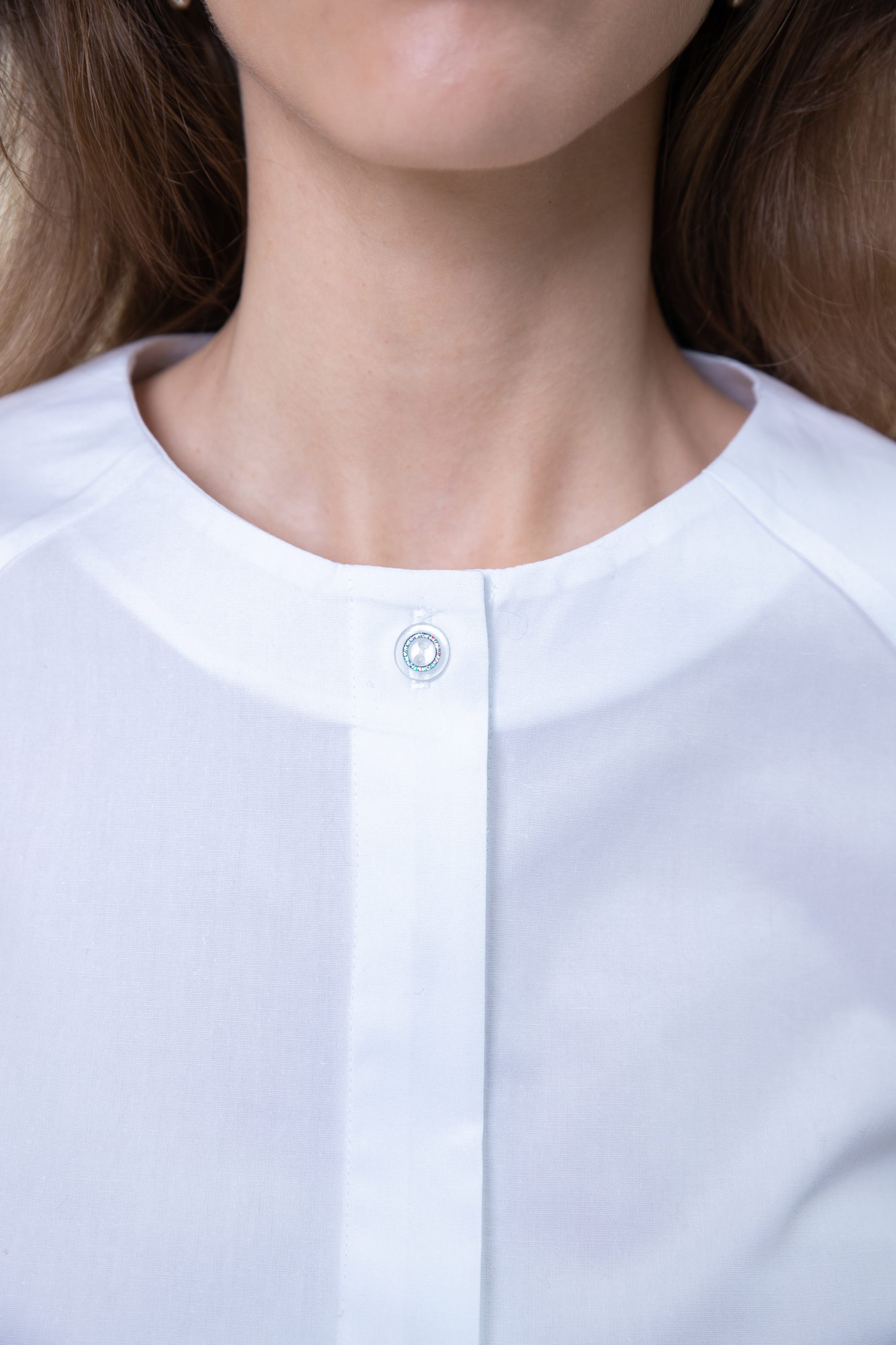 Cotton Poplin Puff Sleeve Blouse In White closeup view.jpg