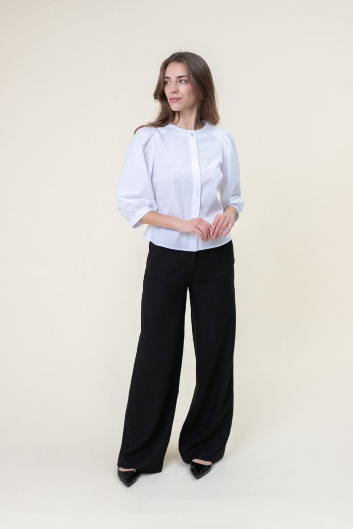 Cotton Poplin Puff Sleeve Blouse In White front view hand in hand.jpg Cotton Poplin Puff Sleeve Blouse In White front view hand in hand.jpg