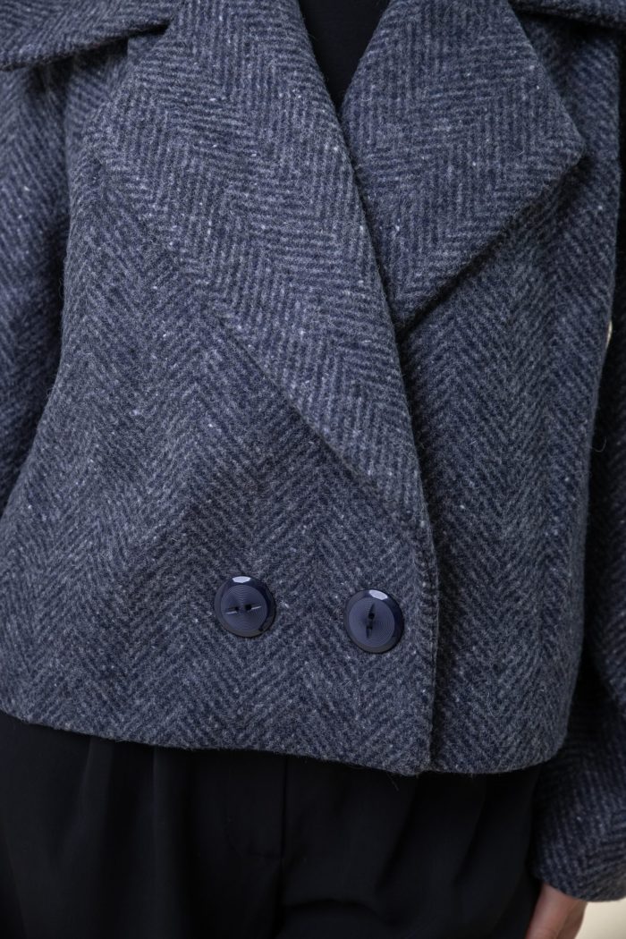 Double Breasted Wool Jacket In Herringbone front closeup view Double Breasted Wool Jacket In Herringbone front closeup view